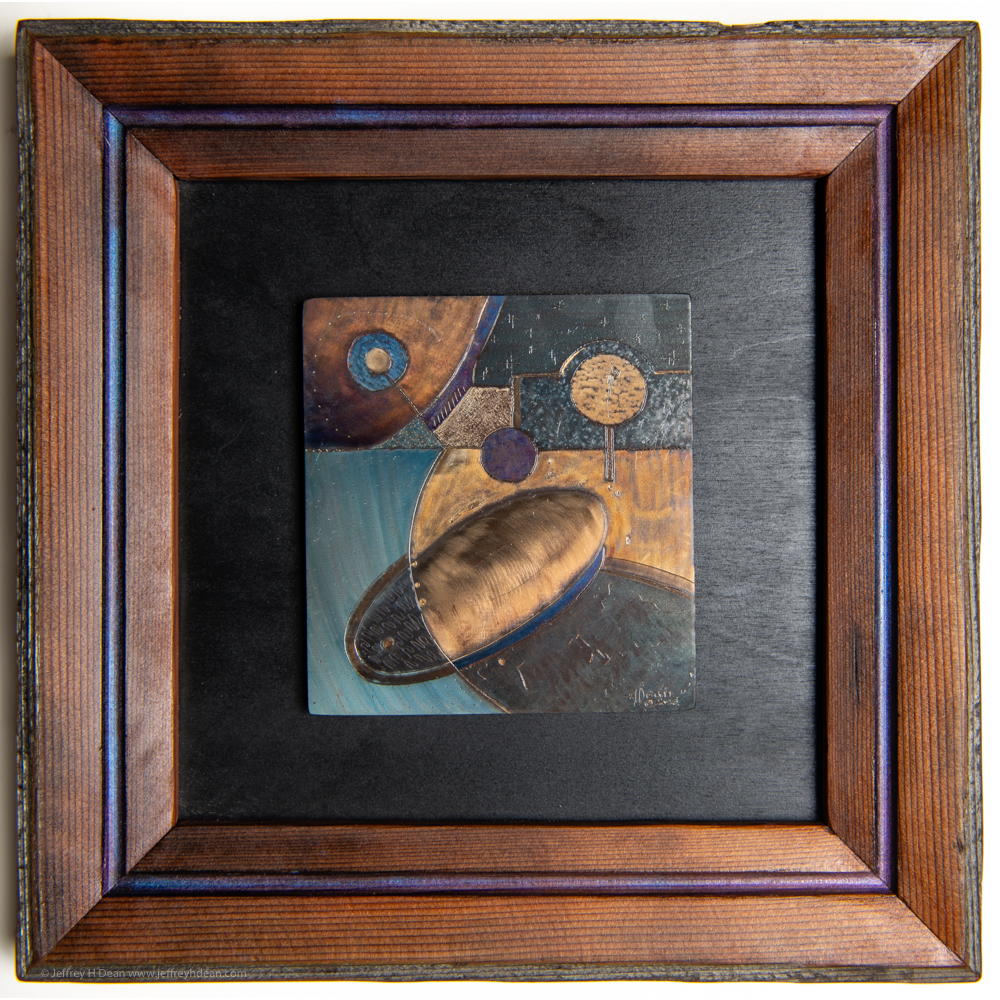 Cosmic Lollipop is one of a series of small geometric and organic abstract heat-colored steel engravings inspired by celestial and natural themes.