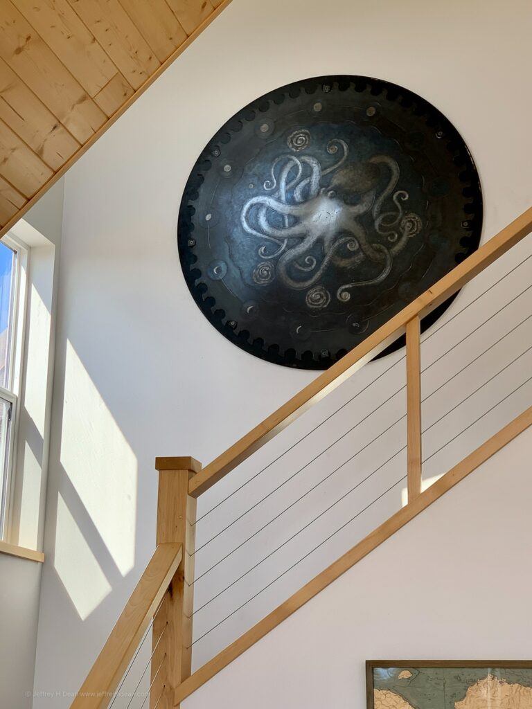 I made this celestial octopus on a large steel saw blade. I framed the 54" diameter blade with a black Baltic birch plywood disc. It hangs in a home on the living room stairwell.