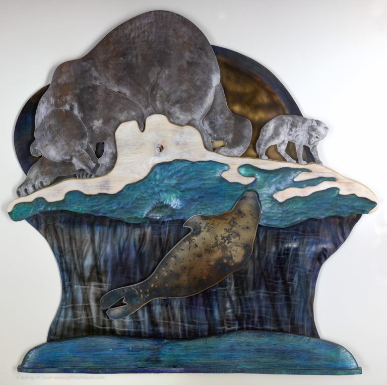 A lone polar bear and arctic fox watch silently as a seal rises to its breathing hole in this layered metal and wood wall art.