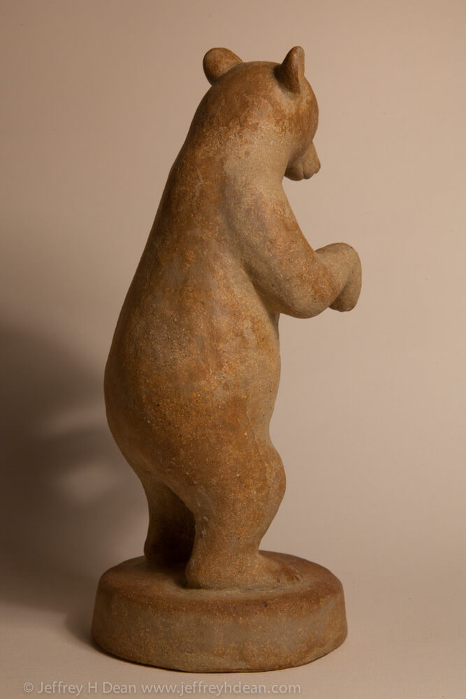 Clay black bear sculpture. Available in bronze.