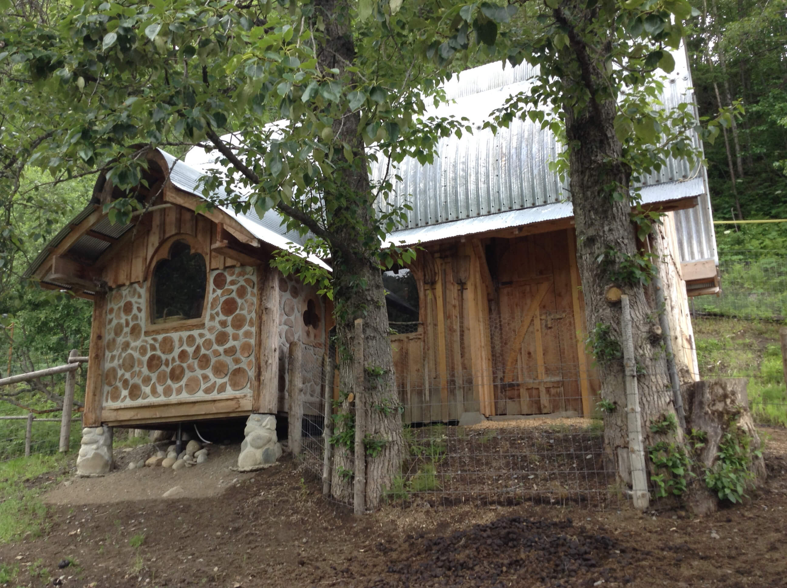 Cordwood tack room in donkey barn at Dean Family Farm and Art Studios.