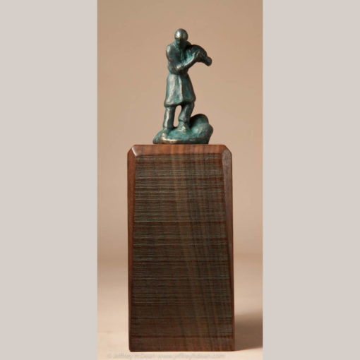 Bronze miniature sculpture of man carrying a basket of mountain herbs.