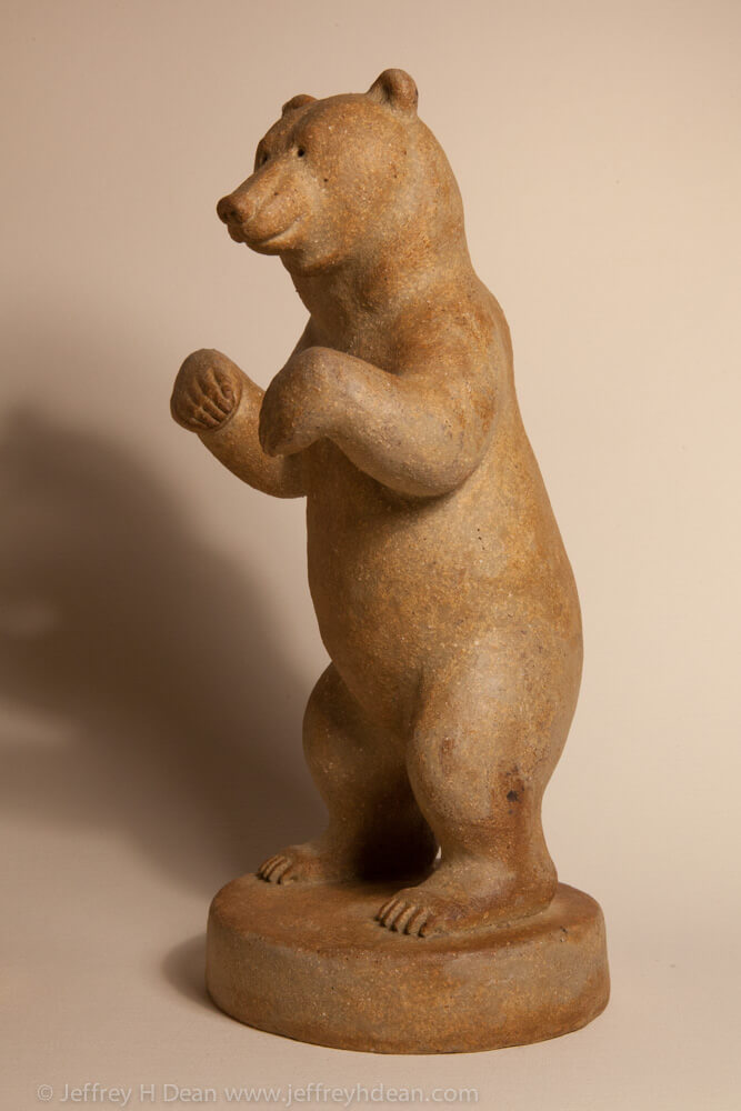 Clay grizzly bear sculpture. Available in bronze.