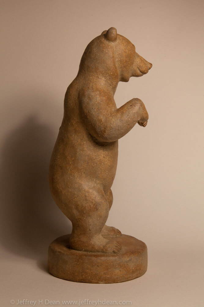 Clay grizzly bear sculpture. Available in bronze.
