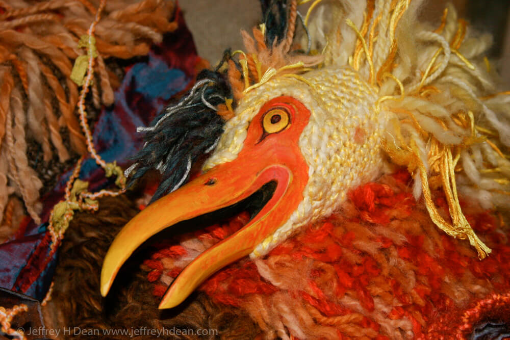 Rising phoenix puppet made from wood, steel strapping and woolen yarn with Grancrete egg.