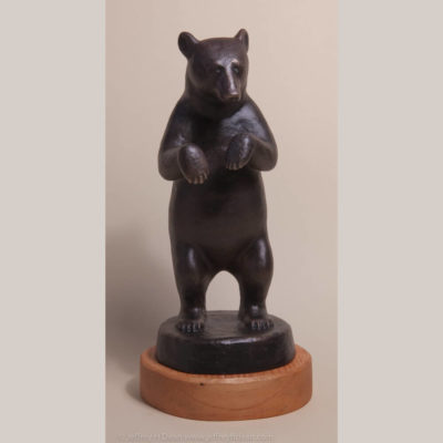 Bronze sculpture of standing black bear