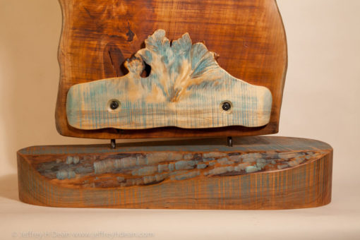 The Three Graces enjoying a much needed visit to the seaside in this black cherry and burly birch wood sculpture.